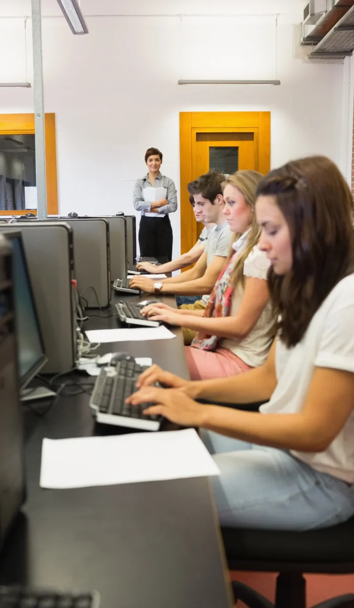 students-sitting-computer-concentrating